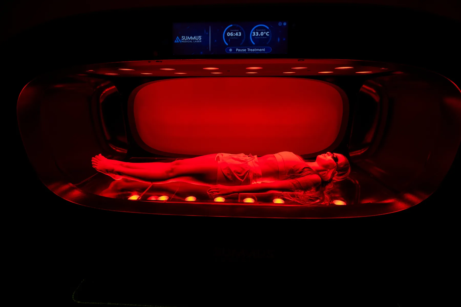 Patient in the full-body laser light pod at The Longevity Club + Clinic in Franklin, TN