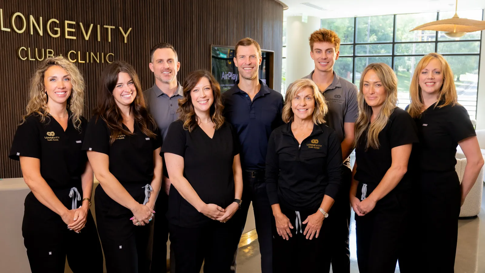 The whole team at The Longevity Club + Clinic in the Franklin, Tennessee lobby